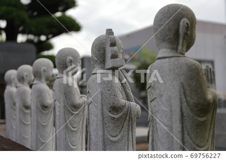 Jizo lined up Jizo lined up 69756227