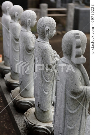 Jizo lined up Jizo lined up 69756228
