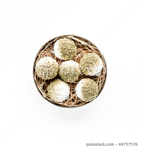 christmas wreath frame made of colored bright golden christmas balls on white background. flat lay, top view christmas wreath frame made of colored bright golden christmas balls on white background. flat lay, top view 69757576