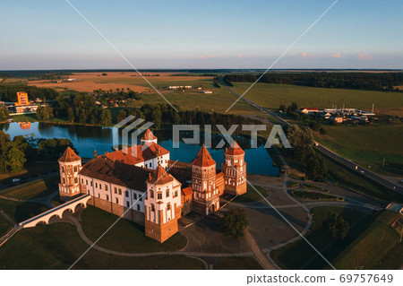 MIR, BELARUS - May 18, 2014: Medieval castle in Mir, Belarus. MIR, BELARUS - May 18, 2014: Medieval castle in Mir, Belarus. 69757649