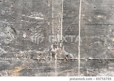 Old concrete wall. Grungy corroded background with many scratches, cracks, and paint stains Old concrete wall. Grungy corroded background with many scratches, cracks, and paint stains 69758789