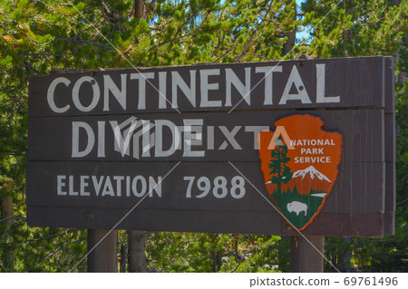 The Continental Divide sign in Yellowstone National Park, Wyoming 69761496