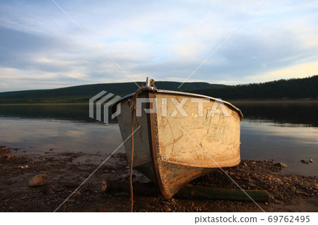boat on the river in summer in Yakutia 69762495