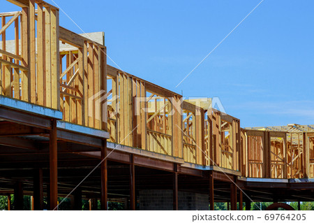 Wood building frame structure on a new development 69764205