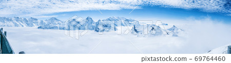 Stunning Panoramic view Snow moutain of the Swiss Skyline from Schilthorn, Switzerland Stunning Panoramic view Snow moutain of the Swiss Skyline from Schilthorn, Switzerland 69764460