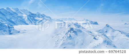 Stunning Panoramic view Snow moutain of the Swiss Skyline from Schilthorn, Switzerland 69764528