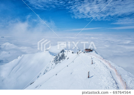 Stunning Panoramic view Snow moutain of the Swiss Skyline from Schilthorn Piz Gloria, Switzerland 69764564