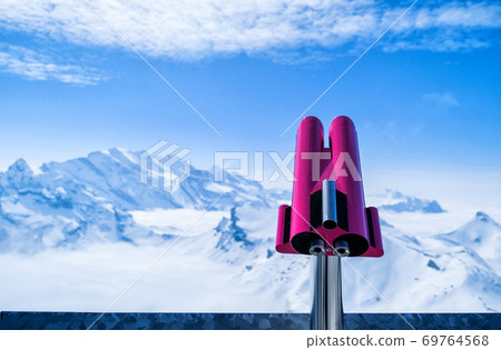 Coin Operated Binocular viewer in Schilthorn Piz Gloria from Murren,Switzerland Coin Operated Binocular viewer in Schilthorn Piz Gloria from Murren,Switzerland 69764568