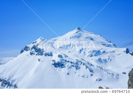 Stunning Panoramic view Snow moutain of the Swiss Skyline from Schilthorn, Switzerland Stunning Panoramic view Snow moutain of the Swiss Skyline from Schilthorn, Switzerland 69764710