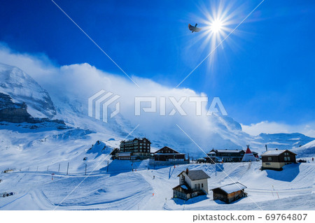 Panoramic view along the railway from Interlaken to Jungfraujoch In daylight at Switzerland Panoramic view along the railway from Interlaken to Jungfraujoch In daylight at Switzerland 69764807