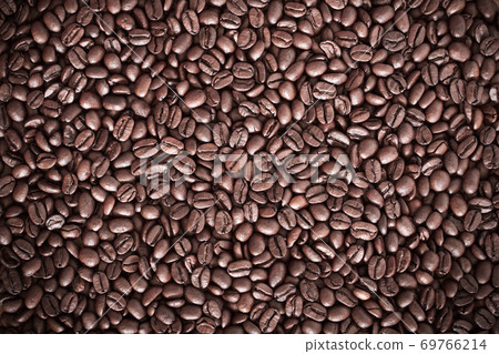 Roasted coffee beans background. Natural texture. Roasted coffee beans background. Natural texture. 69766214