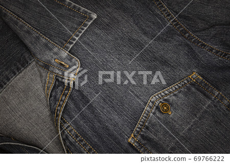 Fabric of Jeans denim texture background, Denim shirt pocket. Fabric of Jeans denim texture background, Denim shirt pocket. 69766222