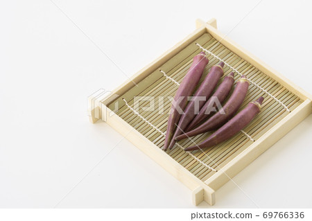 Red okra in a basket Red okra in a basket 69766336