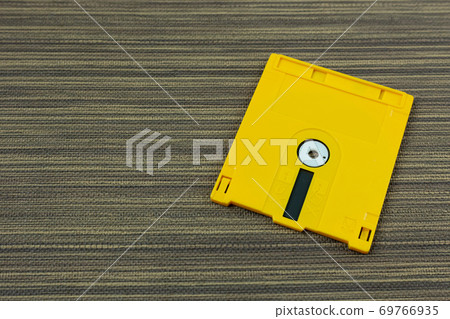 diskette for disk system vintage technology image top view. diskette for disk system vintage technology image top view. 69766935
