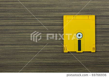 diskette for disk system vintage technology image top view. diskette for disk system vintage technology image top view. 69766936