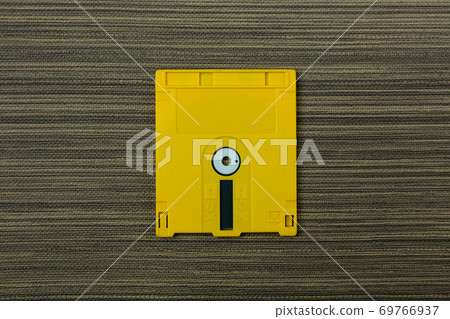diskette for disk system vintage technology image top view. diskette for disk system vintage technology image top view. 69766937