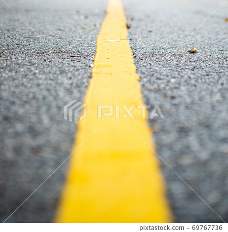 Yellow line on the road. Yellow line on the road. 69767736