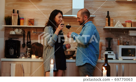 Couple having romantic date Couple having romantic date 69770063