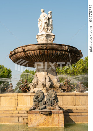 Historical fontaine de la Rotonde with sculpture of lions in Aix-en-Provence Historical fontaine de la Rotonde with sculpture of lions in Aix-en-Provence 69770775