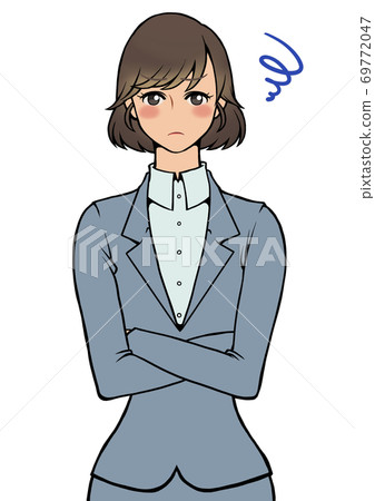 A woman in a moody suit with her arms folded A woman in a moody suit with her arms folded 69772047