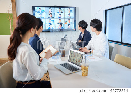 Online conference, video conference, remote work, telework in a conference room with acrylic partition 69772814