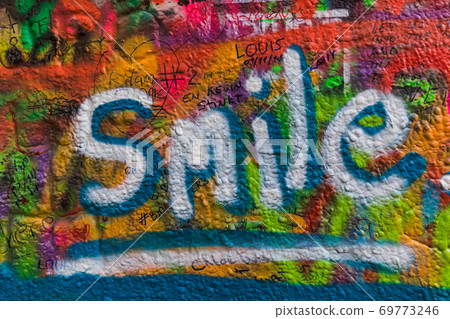 Graffiti on the wall of John Lennon in Prague - Czech Republic Graffiti on the wall of John Lennon in Prague - Czech Republic 69773246