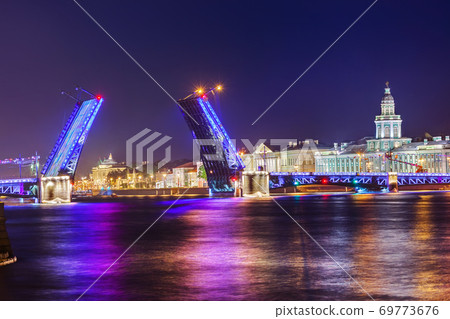 Neva river and open Palace (Dvortsovy) Bridge - Saint-Petersburg Russia 69773676