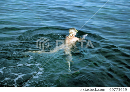 450px x 318px - Naked woman on the nudist beach - Stock Photo [69775639] - PIXTA