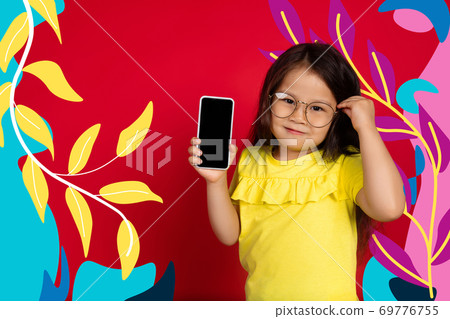 Asian little girl portrait isolated on bright, modern illustrated background. Asian little girl portrait isolated on bright, modern illustrated background. 69776755