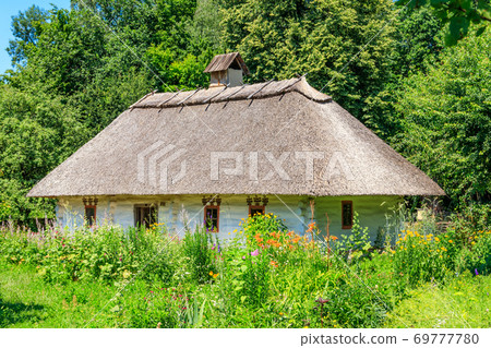 Ancient traditional ukrainian rural house in Pyrohiv (Pirogovo) village near Kiev, Ukraine Ancient traditional ukrainian rural house in Pyrohiv (Pirogovo) village near Kiev, Ukraine 69777780