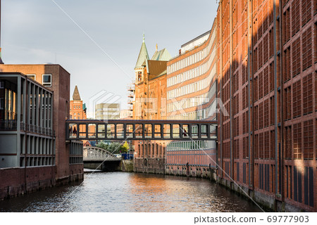 The Warehouse District or Speicherstadt in Hamburg. Wandrahmsfleet canal The Warehouse District or Speicherstadt in Hamburg. Wandrahmsfleet canal 69777903