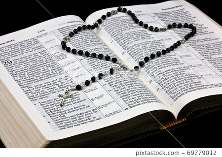 Crucifix on Bible 69779012
