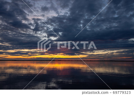 Picturesque sunset at the river 69779323