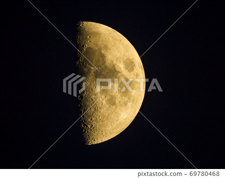 half moon in the dark sky 69780468