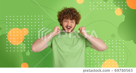 Caucasian man portrait isolated on bright, modern illustrated background. 69780563