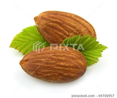 Almonds nuts with leaves 69780957