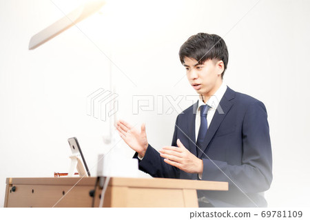 Male student undergoing a remote interview 69781109