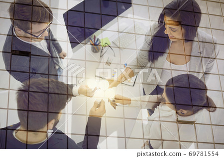 Creative business people brainstorm teamwork ideas in office. Double exposure. 69781554
