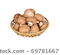 fresh champignon mushroom in bamboo basket on white background 69781667