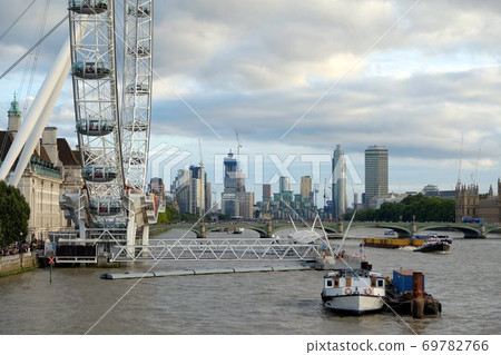 London afternoon. London eye, County Hall, Westminster Bridge, Big Ben and Houses of Parliament. 69782766