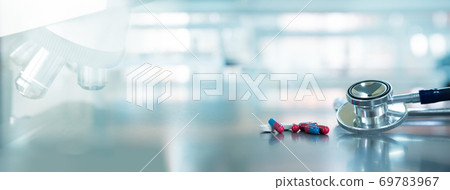 stethoscope for doctor diagnosis and drug capsule and microscope in medical health science laboratory web banner background stethoscope for doctor diagnosis and drug capsule and microscope in medical health science laboratory web banner background 69783967