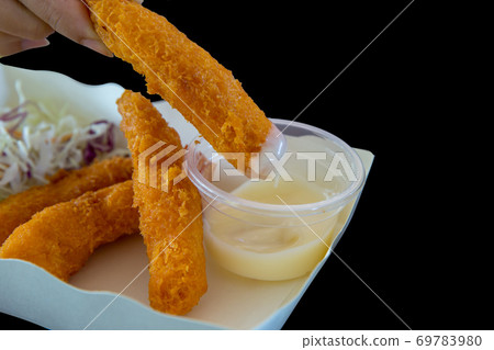 Shrimp tempura deep fried with mayonnaise cream, and shredded cabbage, focus selective Shrimp tempura deep fried with mayonnaise cream, and shredded cabbage, focus selective 69783980