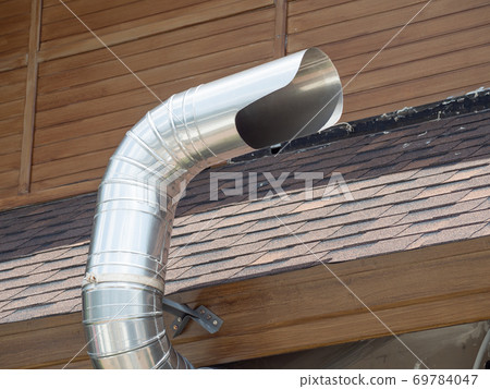 Ventilation and air conditioning pipe installed outside the building. 69784047
