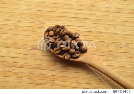 Carefully selected and roasted fresh coffee beans Carefully selected and roasted fresh coffee beans 69784405