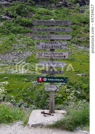 Norway Norwegian railway Bergen line destination display board standing at the entrance of the trekking course from Myrdal station Norway Norwegian railway Bergen line destination display board standing at the entrance of the trekking course from Myrdal station 69784627