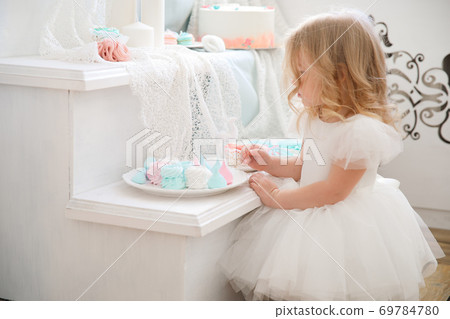 sweet tooth. funny girl secretly eats marshmallows 69784780