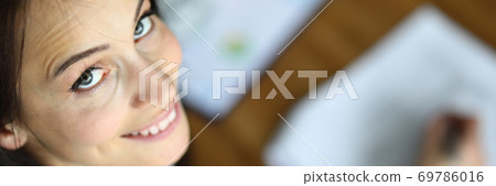 Cheerful young woman in costume Cheerful young woman in costume 69786016