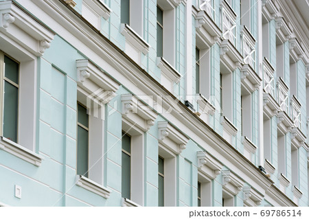 The facade of the building in the classical style. 69786514