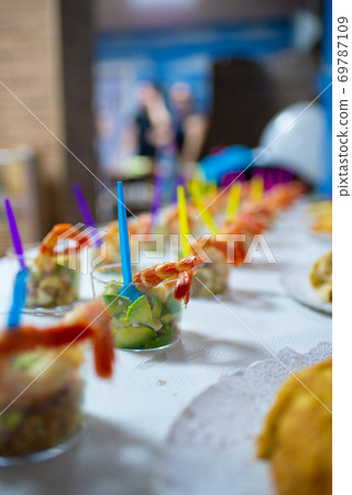 Table full of food at a party 69787109