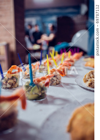 Table full of food at a party 69787112